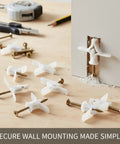 50 Pack Drywall Toggle Anchors With Carbon Steel Screws For Hollow Walls Nylon Mounting Kit showing installation in wall