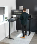 Corner Standing Desk With Electric Height Adjustment 63 X 55 Inch Reversible L Shaped Workstation in home office setup