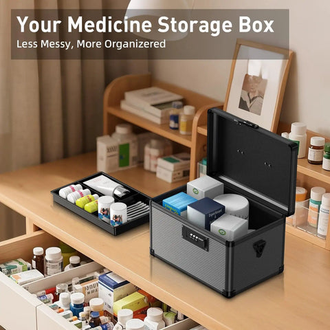 Code Lock Medicine Box With Removable Tray For Home Use Portable First Aid Box For Pills Or Meds Tough Aluminum Alloy Safe Box 10 By 6.9 By 6.9 Inches Black shown open on a wooden desk with various medications.