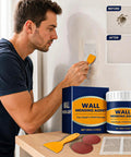 Complete Drywall Repair Kit With Wall Patch Spackle Paste And Sturdy Plastic Scraper For Rapid Hole And Crack Repairs Smooth White Putty That Leaves Surfaces Looking Fresh And Clean being used to repair wall damage.