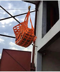 Lock Down Your Gear Without A Sweat With This Badass Heavy Duty Elastic Cargo Net And 2X2M Polyester Lifting Mesh Featuring Four Extended Corner Slings For Safe Industrial Hoisting And Secure Freight Transport, lifting a cargo load.