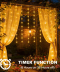 Outdoor Solar Curtain Lights 200 LED Warm White, 13ft By 3.9ft Waterproof String Lights suspended over patio