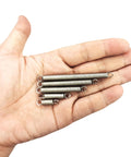 Hand-held close-up of stainless steel extension springs with hook ends; 60-piece assortment, 0.035 inch wire, 1/4 inch OD.