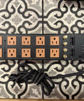 Power Conditioner With Twelve Outlets Built To Crush Voltage Spikes And Lock Down Coax And Ethernet Connections So Your Rig Runs Butter Smooth And Stays Shielded From Damage During Use on a tiled surface.