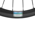 Close-up of 50mm Carbon Clincher Wheelset For 700c Road Bikes With Silver Decal Dope Aero Performance UCI Approved EN Tested Shimano