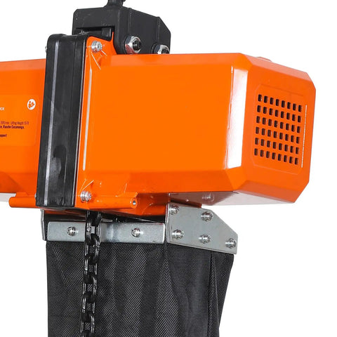 Close-up of Heavy Duty 1100 Lb Electric Chain Hoist with copper motor and chain, designed for 15 Ft lifting in garage or shop.