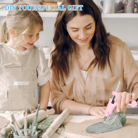 Mother and daughter using pink Mini Hot Glue Gun Set Eight Pack With Forty Sticks Multi Color LED Light Easy To Use For Crafts