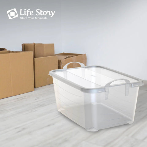 Heavy Duty Stackable Storage Bins Eighteen Pack White Plastic 55 Quart Home Organizers in a room with cardboard boxes.
