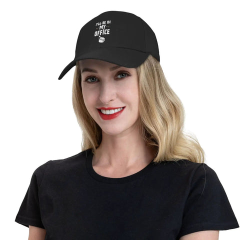 Woman wearing adjustable washed baseball cap dad hat for adults, plain trucker style, office or kitchen. Cool casual vibe hat.