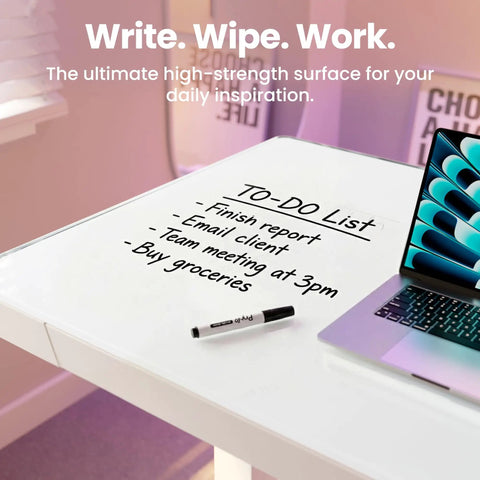 Glass Standing Desk With Drawers, 35 By 20 Inch Electric Adjustable Height, white glass surface with writing and laptop.