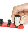 Hand placing socket on Eight Inch Socket Organizer With Nine And A Quarter Inch Twist Lock Clips For Standard And Metric Sockets Red Finish