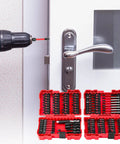 Dang Tough 101 Piece Screwdriver Bit Set Heavy Duty S2 Steel with magnetic bit in use installing door handle.