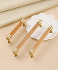 Modern Mid Century Brass And Wood Cabinet Pulls 3 Inch Center To Center Four Pack T Bar Design on beige surface
