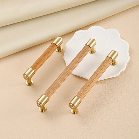 Modern Mid Century Brass And Wood Cabinet Pulls 3 Inch Center To Center Four Pack T Bar Design on beige surface