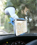 Universal Car Phone Mount Holder With Industrial Strength Sticky Gel Pad And Quick One Hand Release Cradle For Dashboard Windshield, holding smartphone displaying a map.