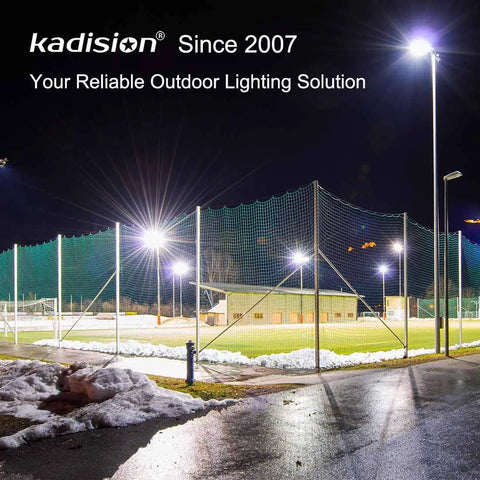 Lit sports field at night showcasing Beefy 200W LED Flood Light With Dusk to Dawn Photocell 26000 Lumens 5000K Cool White