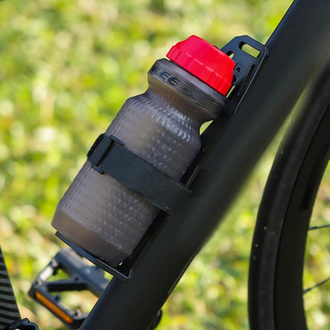 Front Fork Mounted Water Bottle Cage And Cargo Rack For Bikes with fixing strap on bicycle frame holding water bottle securely