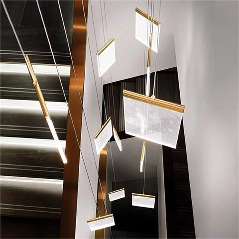 Modern Staircase Chandeliers Led Pendant Light for High Ceiling,Residence with gold accents and multiple hanging panels.