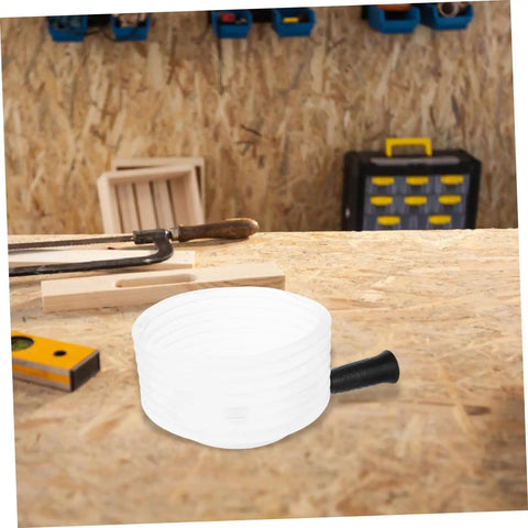 Transparent Drill Dust Collector Cover For Electric Drills And Grinders With Rock Solid Debris Shield on workbench, white and round.