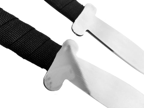 Close-up of Dual Stainless Steel Shaolin Double Dagger Set For Martial Arts Practice And Daily Training with wrapped handles.