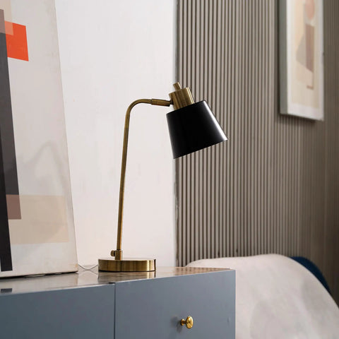 18 Inch Matte Brass Desk Lamp With Matte Black Shade, Adjustable Pivot For Precise Reading And Desk Work, Dope Sleek Modern Mid Century Style Lighting For Home Office Or Nightstand on a cabinet