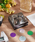 Five Piece Disc Cutter Set With Five Round Punch Sizes One Half Inch, Five Eighths Inch, Three Quarters Inch, Seven Eighths Inch, And One Inch For Jewelry Making And Metal Forming, Durable High Quality Steel Construction on wooden table.