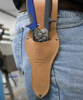 Person carrying Heavy Duty HVAC Cutter Tool With Built In Wire Cutter All Steel Double Edge Blades in leather holster on belt