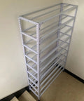 Kickass Heavy White Slotted Angle Iron For Diy Garage Shelving And Storage Rack Builds Craft Your Own Setup With A 98 Foot Roll Of Smooth Painted Steel Frames, white metal shelving unit with multiple shelves.
