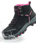 Black and pink waterproof steel toe boot for women, wide fit, slip-resistant with water splashing, suitable for construction work.