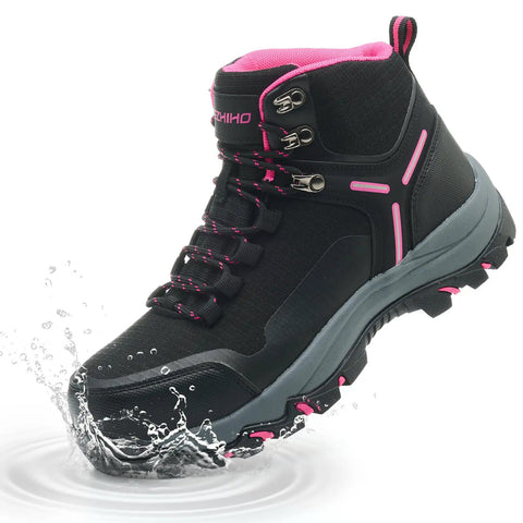 Black and pink waterproof steel toe boot for women, wide fit, slip-resistant with water splashing, suitable for construction work.