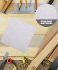 Dope Silicone Furniture Feet Castors And Bumper Pads adhesive sheet with tools on a wooden surface