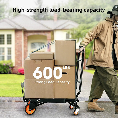 Folding steel hand truck with four rotating wheels and orange rims, loaded with several cardboard boxes.