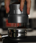 58mm Espresso Coffee Distributor Tool For Even Dosing With 22 Needle Layout Adjustable Depth Grey in use on portafilter