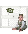 Recycled Plastic Baby Gate Pressure Mounted Doorway Safety Barrier Indoor Outdoor Use with child sitting nearby, pure white eco-friendly design.