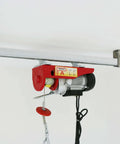 Electric hoist installed on Heavy Duty 5 Feet Strut Channel Trolley Track Built To Last For Wheel Trolley Assemblies, 1-5/8 Inch Height And Width, 12 Gauge Steel U Channel With Short Slotted Back, Pre-Galvanized Zinc Finish For Durability, Pack Of 2 in industrial setting.