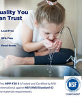 Young girl drinking water from kitchen faucet, emphasizing quality with NSF certification symbols visible.