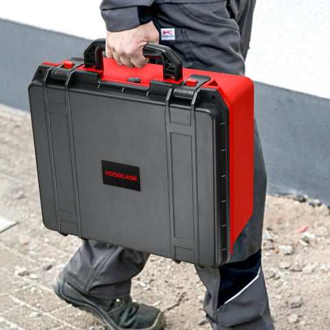Man carrying Waterproof Hard Case For M18 Cordless Tire Inflator 2848-20, black and red durable storage box with handle
