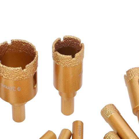 Get The Ultimate 12-Piece Hole Saw Kit With M10 Drill Bits For Ceramics Brick And Glass Plus Dry Wet Drilling Capability Using High Speed Steel Core Bits In Sizes From 6-35MM Perfect For Pros And DIYers Akin To A Total Game Changer. 30mm and 14mm diamond hole saw bits