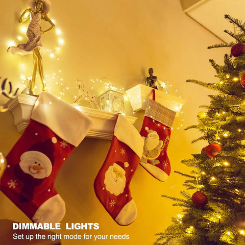 Plug In Fairy Lights 33ft 100 LED Twinkle String Lights With Remote Timer 8 Modes on Christmas stockings and tree