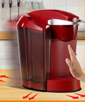 Slick Slide Mat For Keurig K Classic Coffee Maker Slider Pad Mover Extender Tray shown working under a red coffee machine.