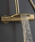Slick Brushed Gold Thermostatic Shower System With Stable Flow Rainfall Head Wall Mounted Bathroom Faucet Set featuring waterfall spout.