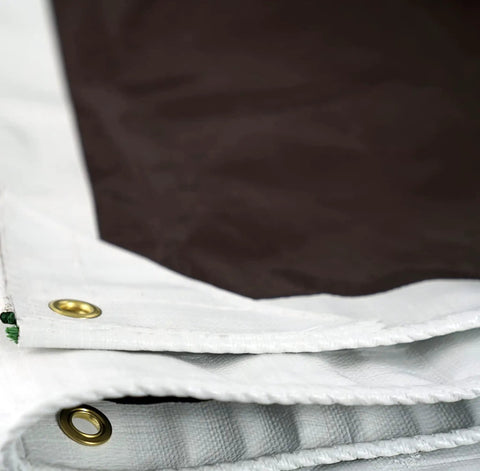 Close-up of a 20 Foot By 20 Foot Beefy Tough As Nails Waterproof Tarp 16 Mil Thick White And Brown Reversible Cover with reinforced corners.