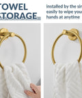 Wall Mounted Brushed Gold Towel Ring Crafted From Solid 304 Stainless Steel Rustproof And Built Tough For Bathroom Decor Or Kitchen Sink Station That Holds Up Under Pressure While Looking Fresh And Making Your Space Pop, installed by the sink with a white towel.