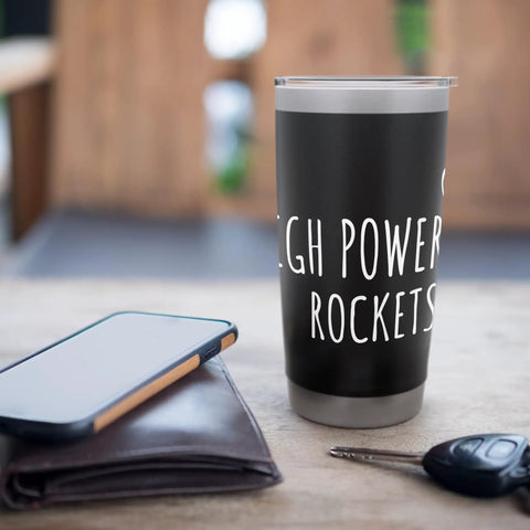 Rocketry Nerds Stainless Steel Insulated Tumbler For Engineers And STEM Buffs on table with phone and keys