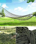 Army Green Outdoor Travel Hammock With Mesh Net Nylon Rope Construction hanging between trees in a grassy field.