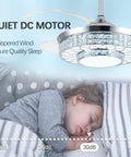 42 Inch Retractable Ceiling Fan With Bright Lights, Smooth App Controlled Crystal Chandelier above a sleeping child for peaceful airflow.