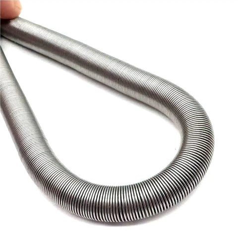 Heavy Duty Galvanized Steel Compression Spring Built Tough For Hydraulic Hose Shield And Silicone Tube Guard With Rock Solid Corrosion Resistance For Hassle Free Outdoor Maintenance And Smooth Operation On Every Machine Job, close-up view.
