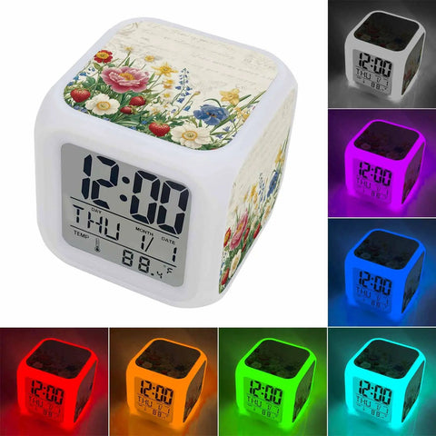 Fresh Spring Flower Printed Cube Digital Desk Clock Running Completely Silent With Sleek Date And Temp Screen Soft Glow Nightlight Mode And Auto Snooze For Chillin On Your Bedside Table Or Home Office Desk Setup.