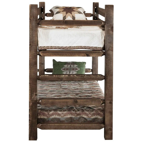 Front view of Twin Over Twin Bunk Bed From The Homestead Collection In Stain, handcrafted in America from lodge pole pine with built-in ladders.