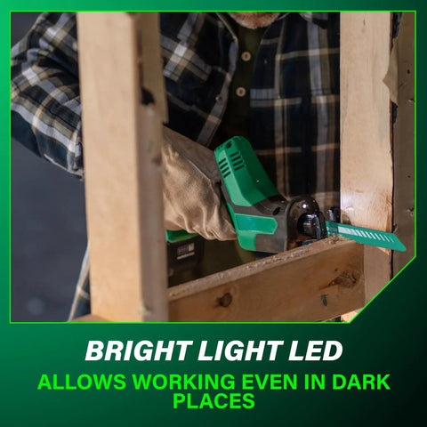 Person using 18V Cordless One Handed Reciprocating Saw, Ultra Lightweight And Compact with LED light in dim workspace